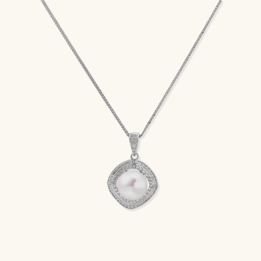 Cushion-shaped double halo pendant with 10mm freshwater pearl center on rhodium-plated sterling silver chain